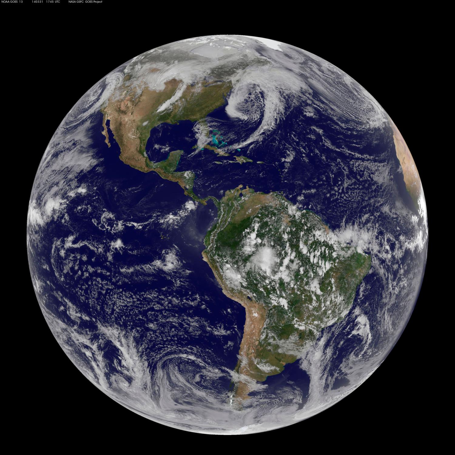 NOAA's GOES-13 and GOES-15 satellite image from March 31, 2014 and released on April 1, 2014 shows the low pressure systems in the eastern Pacific Ocean, over the United States' Heartland, and in the eastern Atlantic Ocean. All three lows have the signature comma shape that make them appear to be curled up dragons. REUTERS/NASA/Handout via Reuters (OUTER SPACE - Tags: ENVIRONMENT) ATTENTION EDITORS - THIS IMAGE WAS PROVIDED BY A THIRD PARTY. FOR EDITORIAL USE ONLY. NOT FOR SALE FOR MARKETING OR ADVERTISING CAMPAIGNS. THIS PICTURE IS DISTRIBUTED EXACTLY AS RECEIVED BY REUTERS, AS A SERVICE TO CLIENTS - GM1EA420BUW01