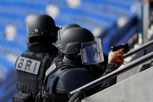 Members of French special police forces of Research and Intervention Brigade (BRI) take part in a drill inside the Groupama Stadium in Decines, near Lyon, France,  as part of a G6 Interior Ministers meeting of the six largest EU countries to discuss security and anti-terror issues, October 9, 2018.  REUTERS/Emmanuel Foudrot - RC1259805A00