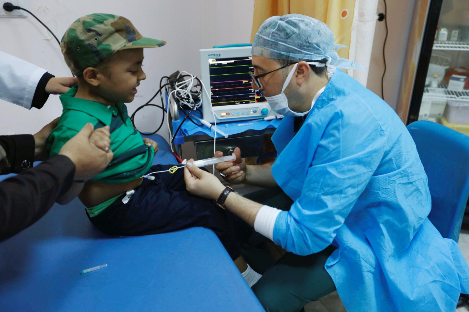 A child gets an injection of chemotherapy at the Misurata Cancer Center in Misurata, Libya August 5, 2018. Picture taken August 5, 2018. REUTERS/Ismail Zitouny - RC1855561670