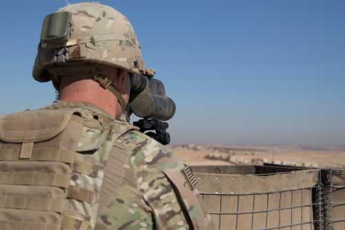 A U.S. Soldier surveils the area during a combined joint patrol in Manbij, Syria, November 1, 2018. Picture taken on November 1, 2018. Courtesy Zoe Garbarino/U.S. Army/Handout via REUTERS   ATTENTION EDITORS - THIS IMAGE HAS BEEN SUPPLIED BY A THIRD PARTY. - RC12430AAF20