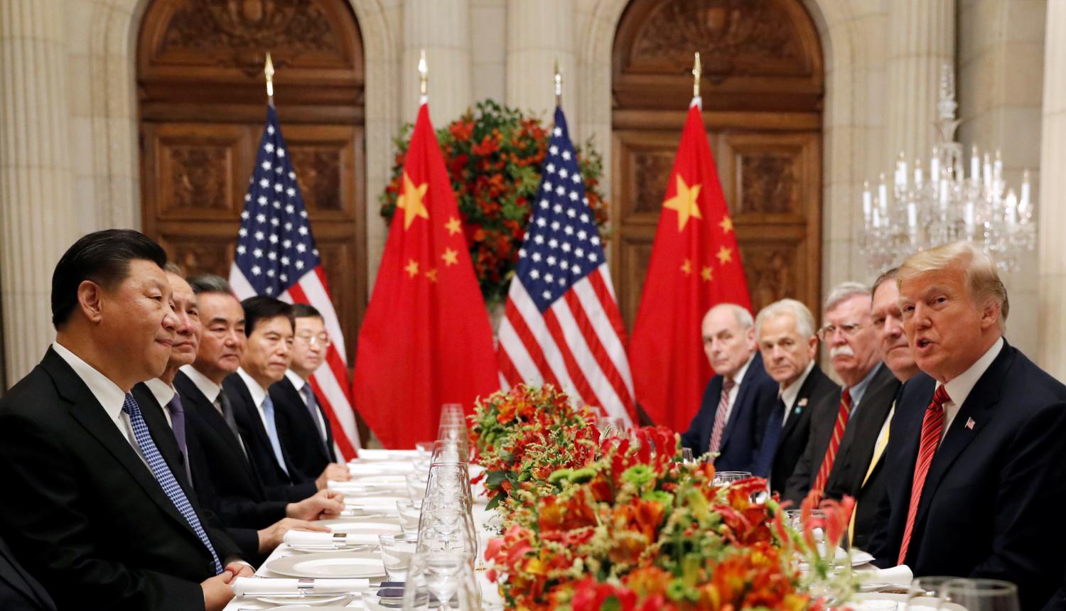 U.S. President Donald Trump, U.S. Secretary of State Mike Pompeo, U.S. President Donald Trump's national security adviser John Bolton and Chinese President Xi Jinping attend a working dinner after the G20 leaders summit in Buenos Aires, Argentina December 1, 2018. REUTERS/Kevin Lamarque