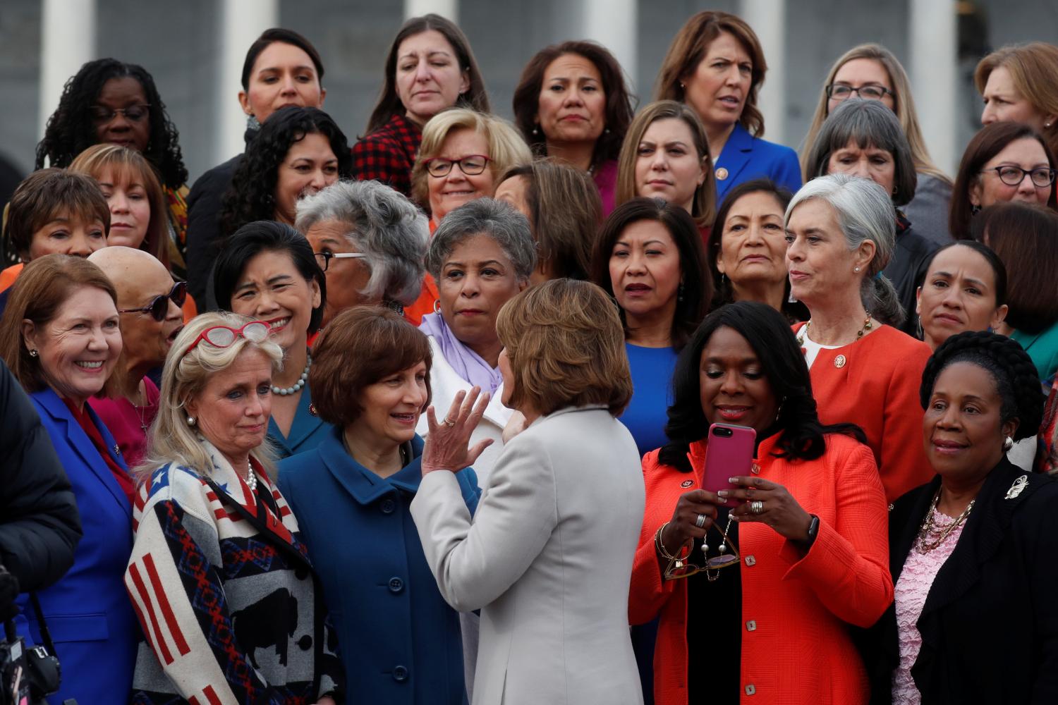 U.S. House Speaker Nancy Pelosi (D-CA) talks with House Democratic women during a photo opportunity on the second day of the new (116th) Congress on Capitol Hill in Washington, U.S., January 4, 2019. REUTERS/Leah Millis?? - RC1CC93812C0