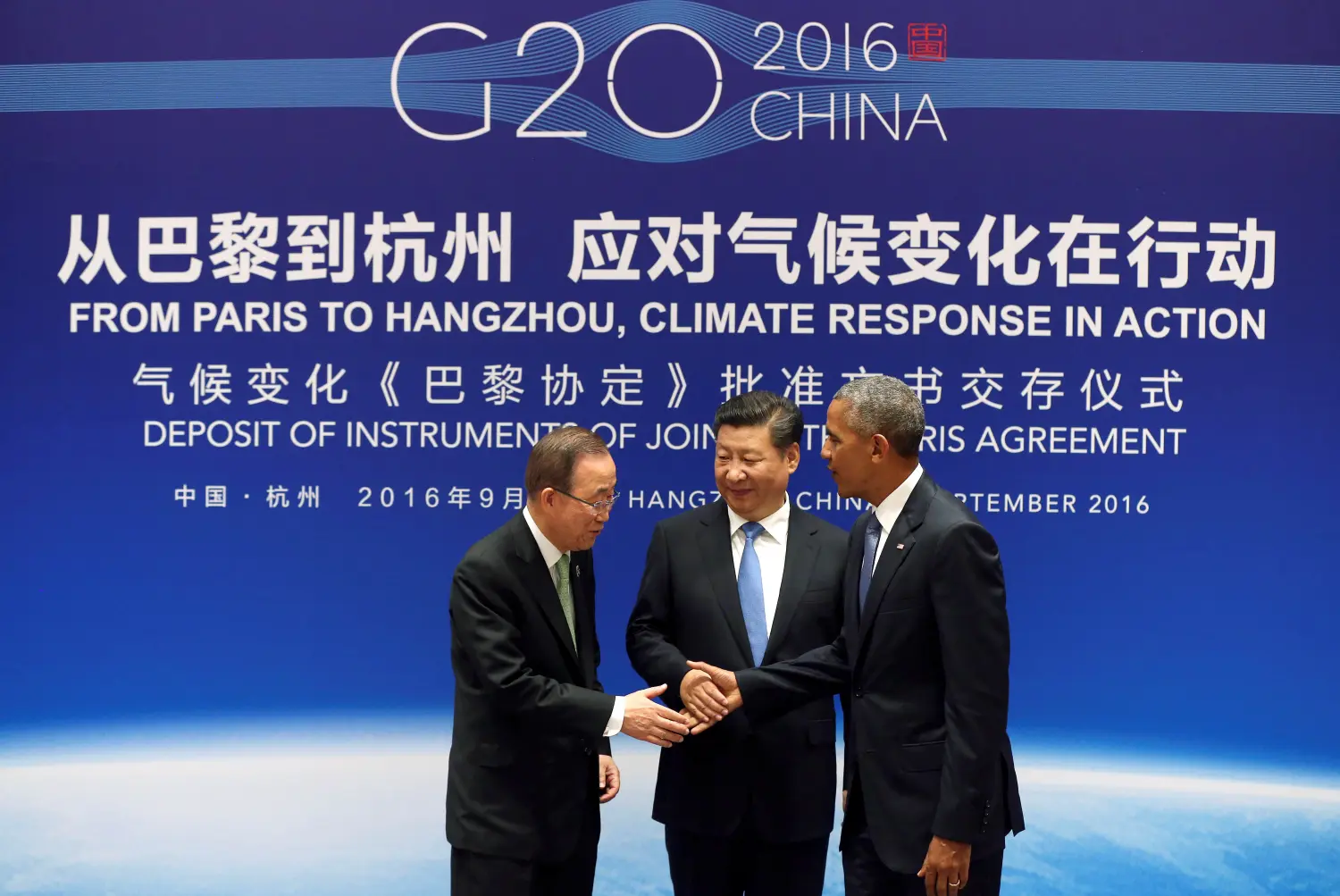 Chinese President Xi Jinping (C), UN Secretary General Ban Ki-moon and U.S. President Barack Obama (R) shake hands during a joint ratification of the Paris climate change agreement ceremony ahead of the G20 Summit at the West Lake State Guest House in Hangzhou, China on September 3, 2016. REUTERS/How Hwee Young/Pool/File Photo - TM3ECBA1TEJ01