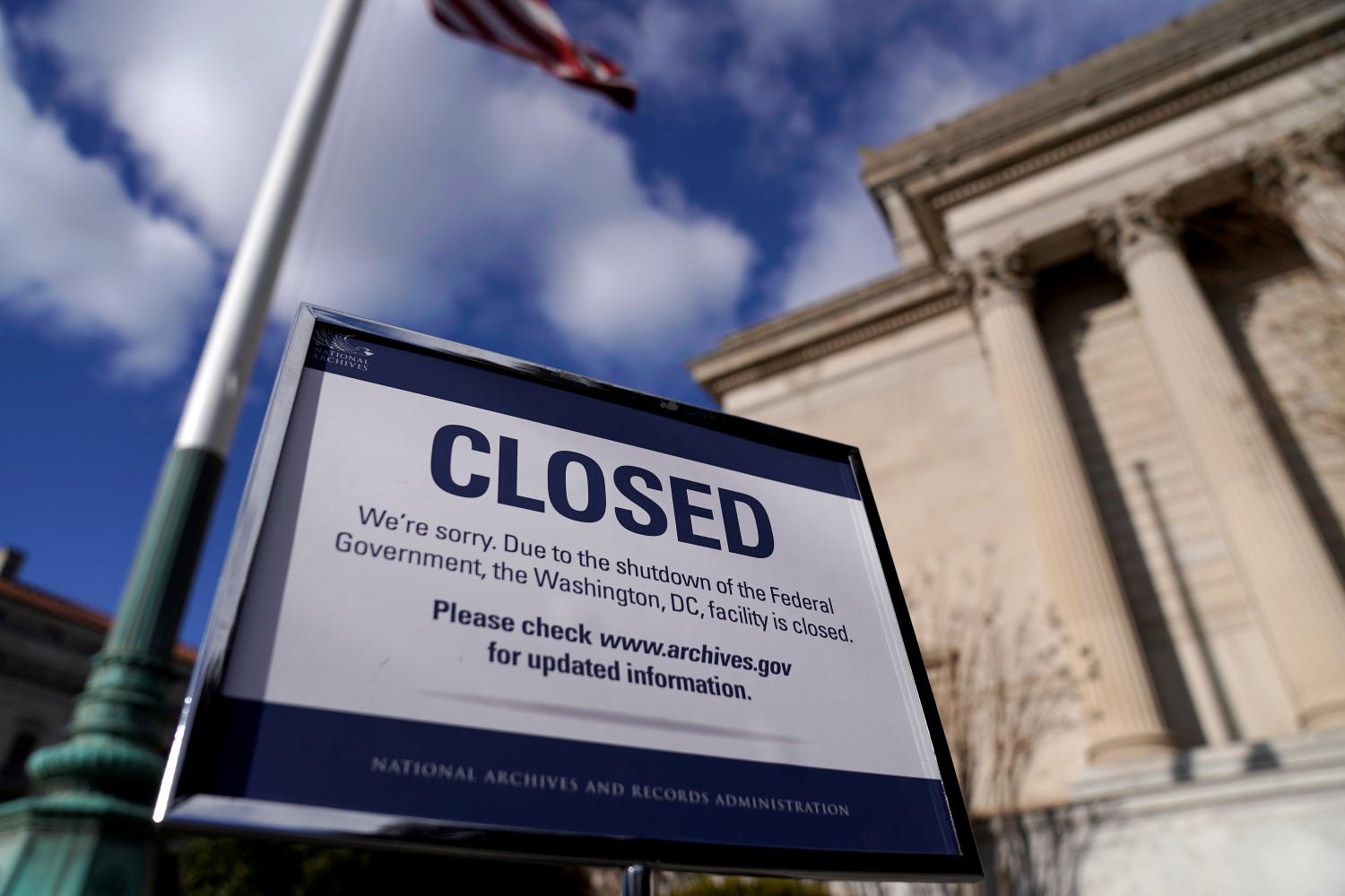 FILE PHOTO: A sign declares the National Archive is closed due to a partial federal government shutdown in Washington, U.S., December 22, 2018. REUTERS/Joshua Roberts/File Photo/File Photo - RC137B87FED0