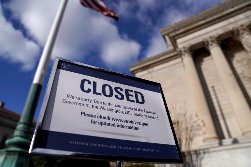 FILE PHOTO: A sign declares the National Archive is closed due to a partial federal government shutdown in Washington, U.S., December 22, 2018. REUTERS/Joshua Roberts/File Photo/File Photo - RC137B87FED0