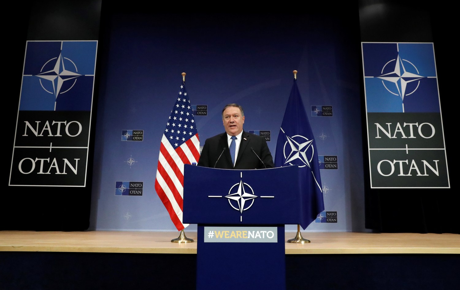 U.S. Secretary of State Mike Pompeo attends a news conference at the Alliance's headquarters, in Brussels.