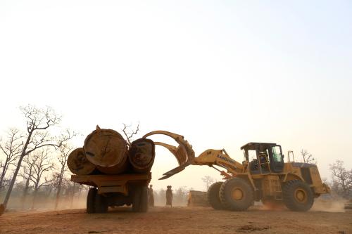 Teak logs are loaded onto a lorry at a logging camp in Pinlebu township, Sagaing division in northern Myanmar March 9, 2014. Picture taken March 9, 2014.  To match story MYANMAR-FORESTS/  REUTERS/Soe Zeya Tun (MYANMAR - Tags: BUSINESS SOCIETY TPX IMAGES OF THE DAY) - GM1EA3L14CT01