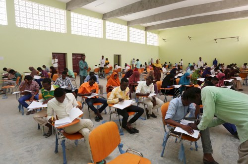 Somali secondary school students sit for their national examinations in the capital Mogadishu June 15, 2015. REUTERS/Feisal Omar - GF10000127973