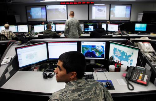 2Lt William Liggett works at the Air Force Space Command Network Operations & Security Center at Peterson Air Force Base in Colorado Springs, Colorado July 20, 2010. U.S. national security planners are proposing that the 21st century's critical infrastructure -- power grids, communications, water utilities, financial networks -- be similarly shielded from cyber marauders and other foes. The ramparts would be virtual, their perimeters policed by the Pentagon and backed by digital weapons capable of circling the globe in milliseconds to knock out targets.  To match Special Report  USA-CYBERWAR/          REUTERS/Rick Wilking (UNITED STATES - Tags: CRIME LAW MILITARY SCI TECH POLITICS) - GM1E6A51S9901