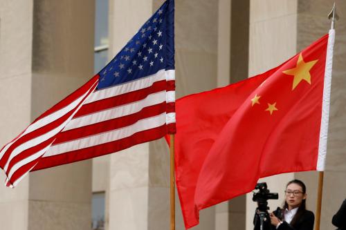 U.S. and Chinese flags are seen before Defense Secretary James Mattis welcomes  Chinese Minister of National Defense Gen. Wei Fenghe to the Pentagon in Arlington, Virginia, U.S., November 9, 2018. REUTERS/Yuri Gripas - RC138EB22270