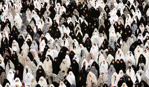 EDITORS' NOTE: Reuters and other foreign media are subject to Iranian restrictions on their ability to report, film or take pictures in Tehran.Women attend Friday prayers in Tehran February 4, 2011. REUTERS/Raheb Homavandi (IRAN - Tags: RELIGION SOCIETY IMAGES OF THE DAY) - GM1E7241PET01