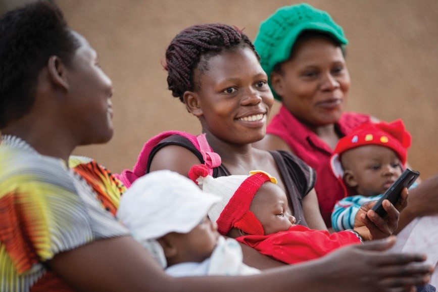 Mothers in Kenya using an access.mobile application