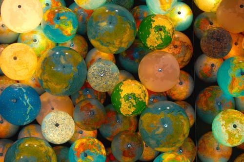 Miniature globes illuminated. Photo: ptwo/Flickr. CC BY 2.0