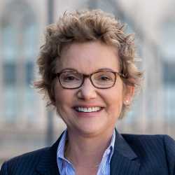 headshot of Mary Daly