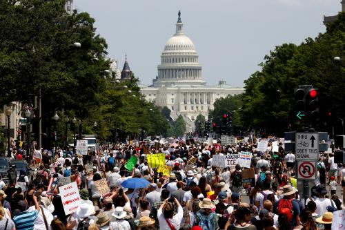 Immigration activists march toward the U.S. Capitol to protest the Trump Administration's immigration policy in Washington, U.S., June 30, 2018.      REUTERS/Joshua Roberts - RC1726866820