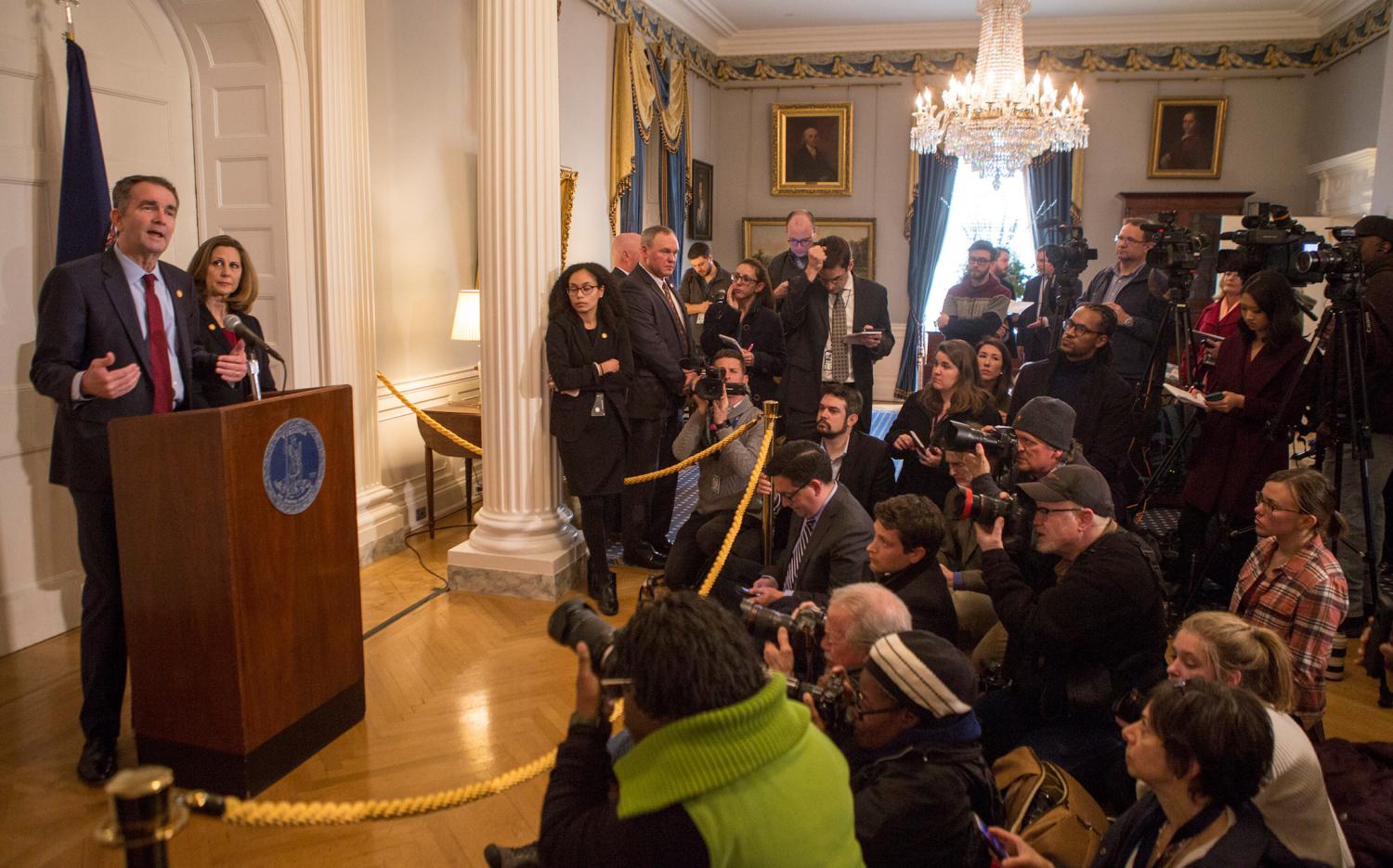 Virginia Governor Ralph Northam, accompanied by his wife Pamela Northam announces he will not resign during a news conference Richmond, Virginia, U.S. February 2, 2019. REUTERS/ Jay Paul - RC1D96C8E7D0