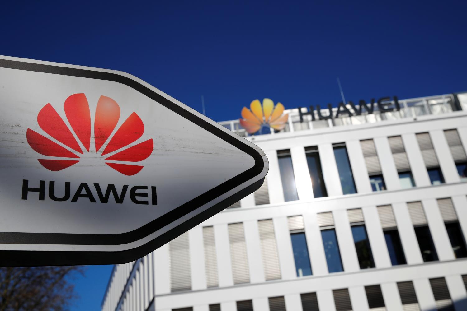 The logo of Huawei Technologies is pictured in front of the German headquarters of the Chinese telecommunications giant in Duesseldorf, Germany, February 18, 2019.    REUTERS/Wolfgang Rattay - RC16C5079E90