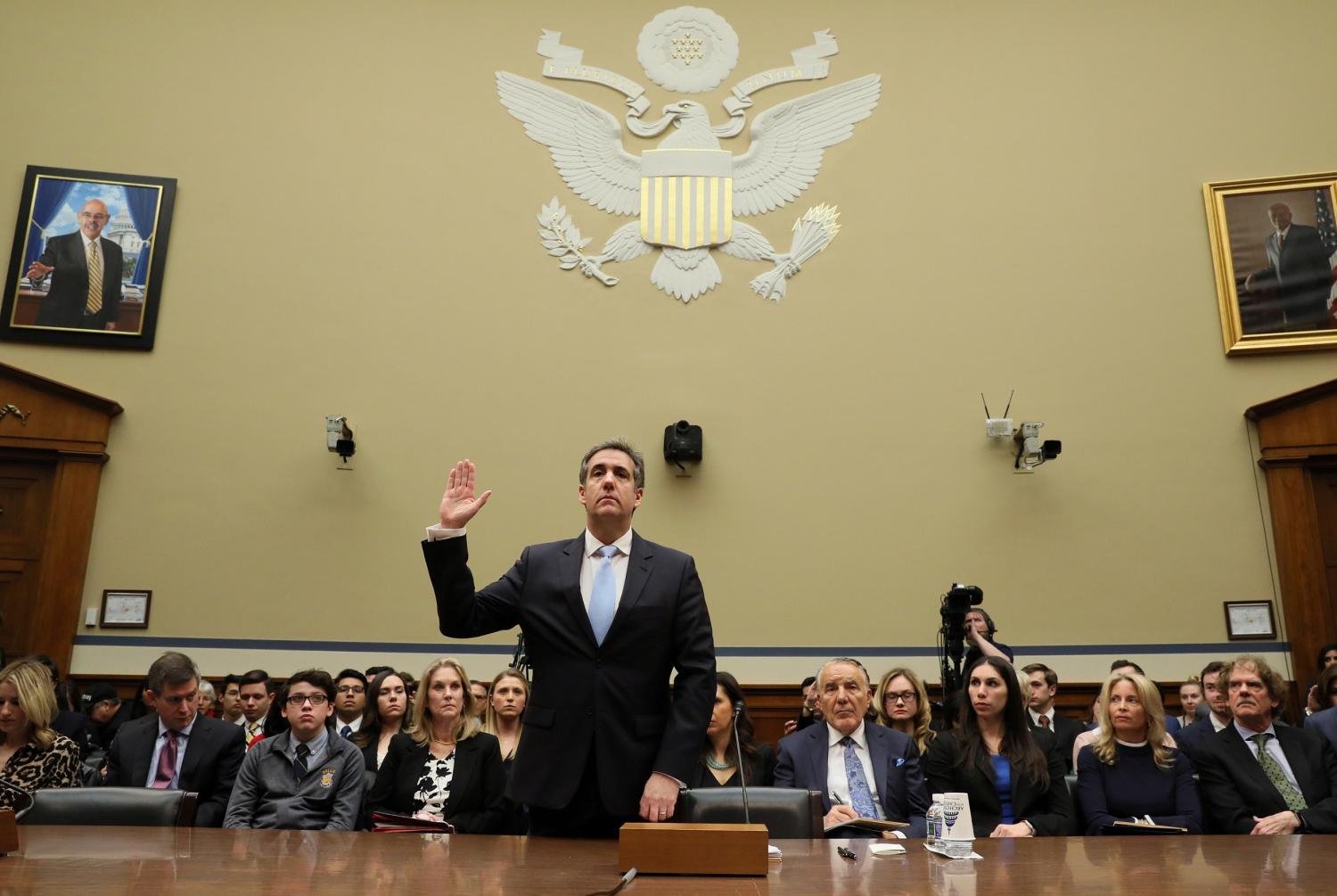 Michael Cohen, the former personal attorney of U.S. President Donald Trump, is sworn in to testify before a House Committee on Oversight and Reform hearing on Capitol Hill in Washington, U.S., February 27, 2019. REUTERS/Jonathan Ernst - RC1942B18160