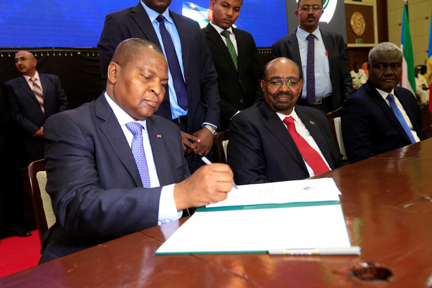 Central African Republic President Faustin Archange Touadera signs a peace deal between the Central African Republic government and 14 armed groups following two weeks of talks in the Sudanese capital Khartoum, Sudan, February 5, 2019. REUTERS/Mohamed Nureldin Abdallah - RC145AE69E40