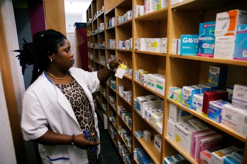 A vendor checks the stock of medicine at a legal pharmacy in Abidjan, Ivory Coast October 16, 2018. Picture taken October 16, 2018. REUTERS/Luc Gnago - RC1790222440