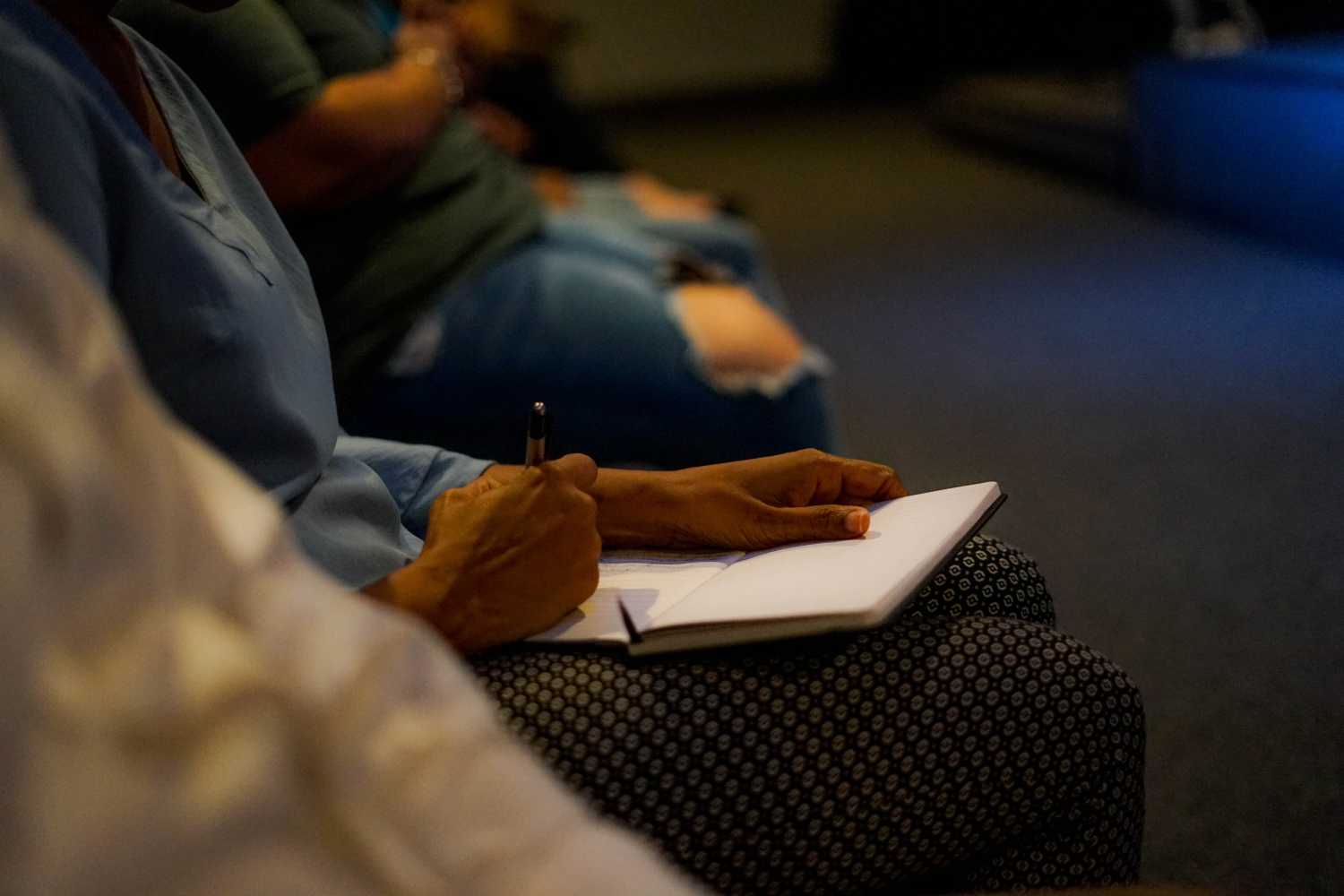taking notes at a conference