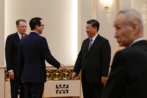 U.S. Treasury Secretary Steven Mnuchin, second from left, talks with Chinese President Xi Jinping as U.S. Trade Representative Robert Lighthizer, left, and Chinese Vice Premier Liu He, right, look on before their meeting at the Great Hall of the People in Beijing, China February 15, 2019. Andy Wong/Pool via REUTERS - RC1AFFB71800
