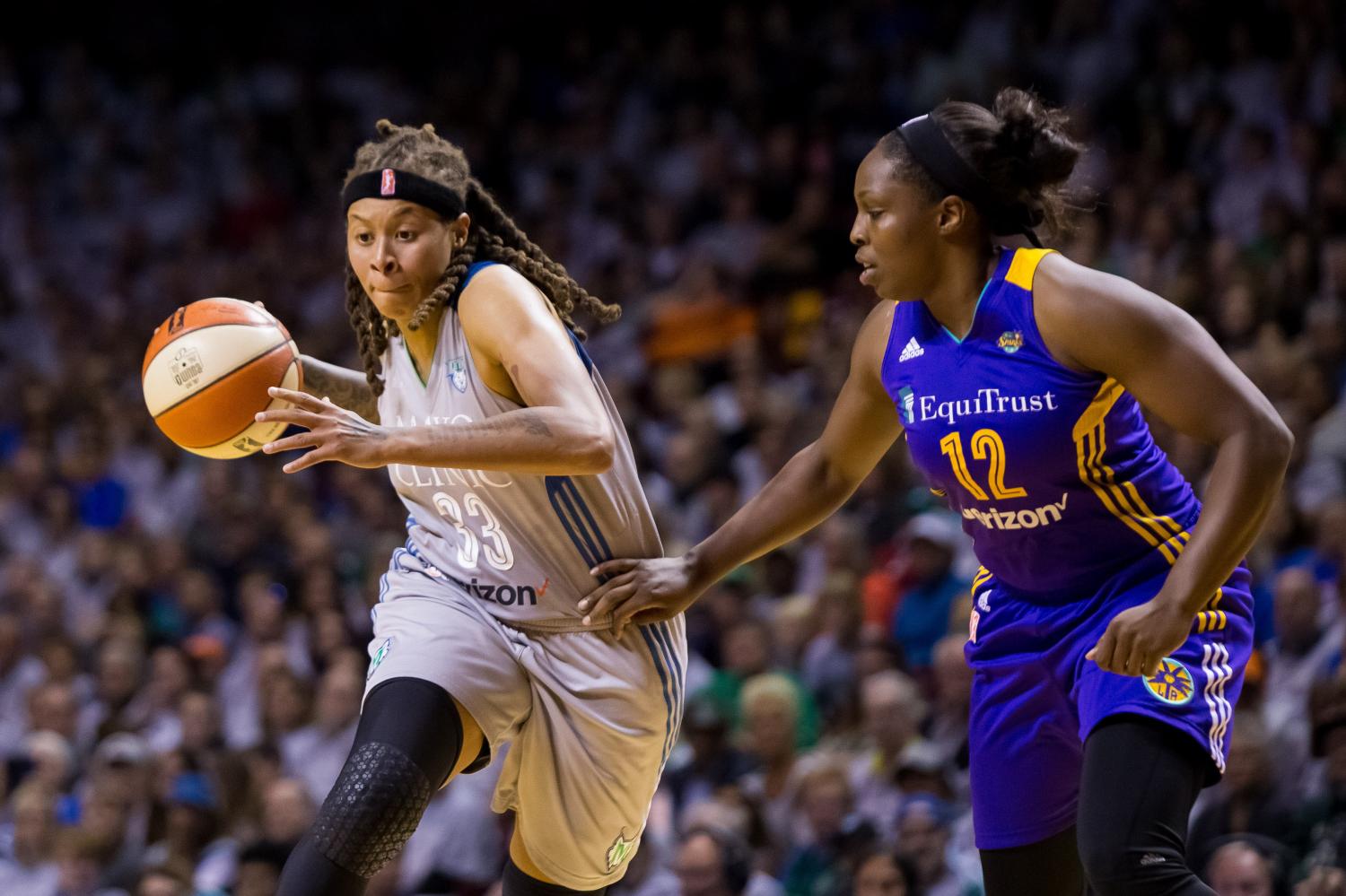 Oct 4, 2017; Minneapolis, MN, USA; Minnesota Lynx guard Seimone Augustus (33) dribbles in the second quarter against the Los Angeles Sparks guard Chelsea Gray (12) in Game 5 of the WNBA Finals at Williams Arena. Mandatory Credit: Brad Rempel-USA TODAY Sports - 10327830