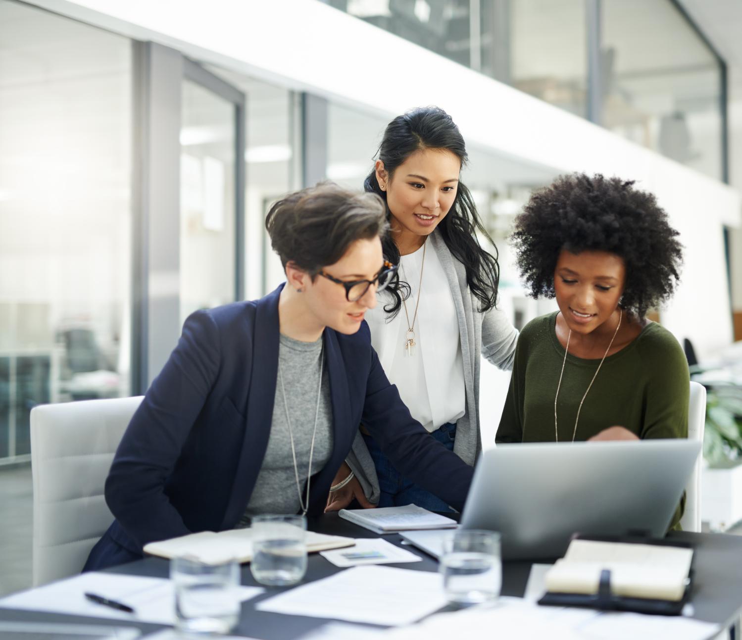 Group of businesswomen using computer