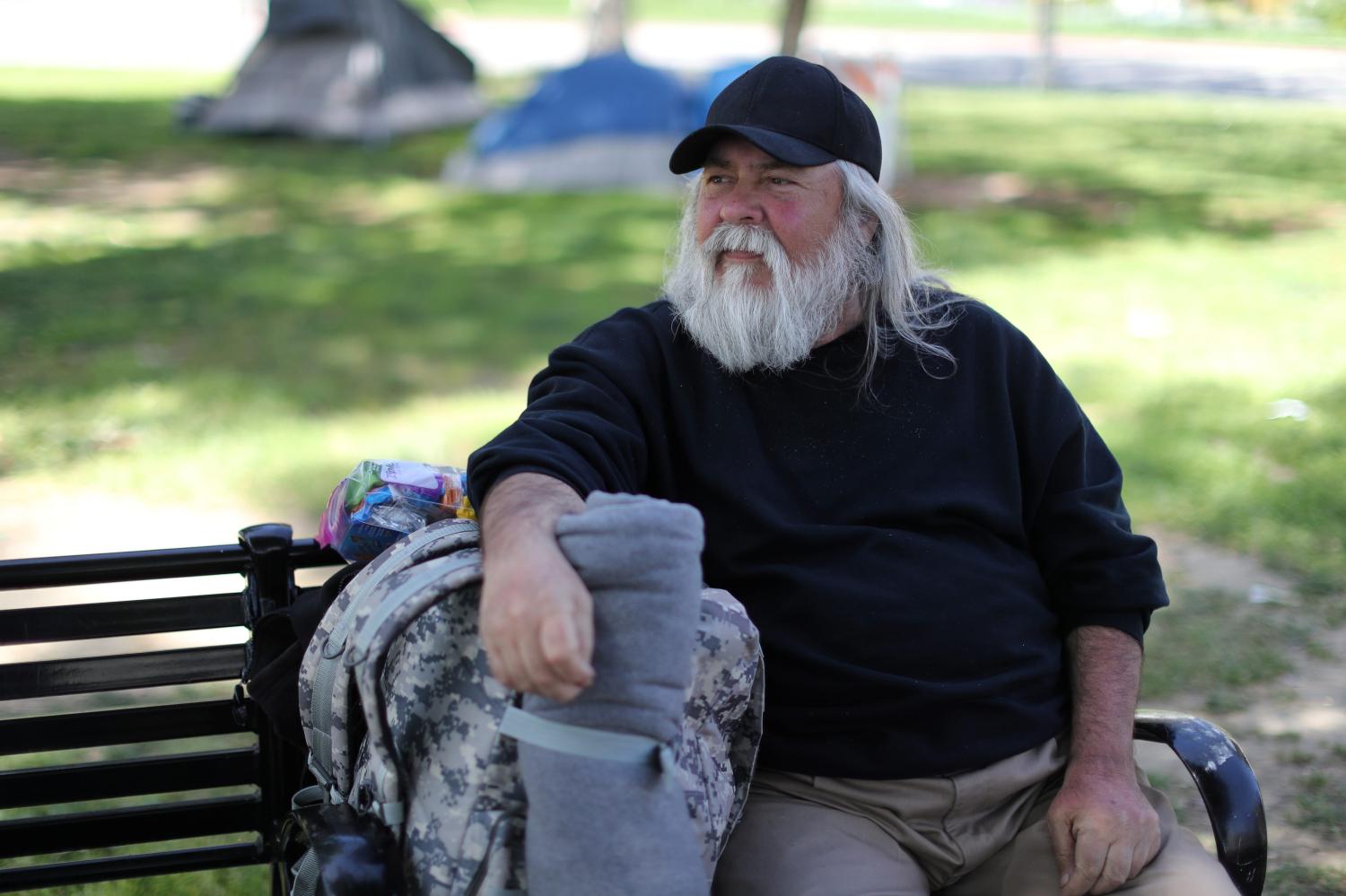 Fernando Ochoa, 65, who has been homeless for a week, sits on a park bench in Los Angeles, California, U.S. April 11, 2018. Ochoa said he had worked as a foreman for Albertson's and a Service Advisor for Honda but is now retired and is looking for housing. Picture taken April 11, 2018. REUTERS/Lucy Nicholson - RC1B16E55500