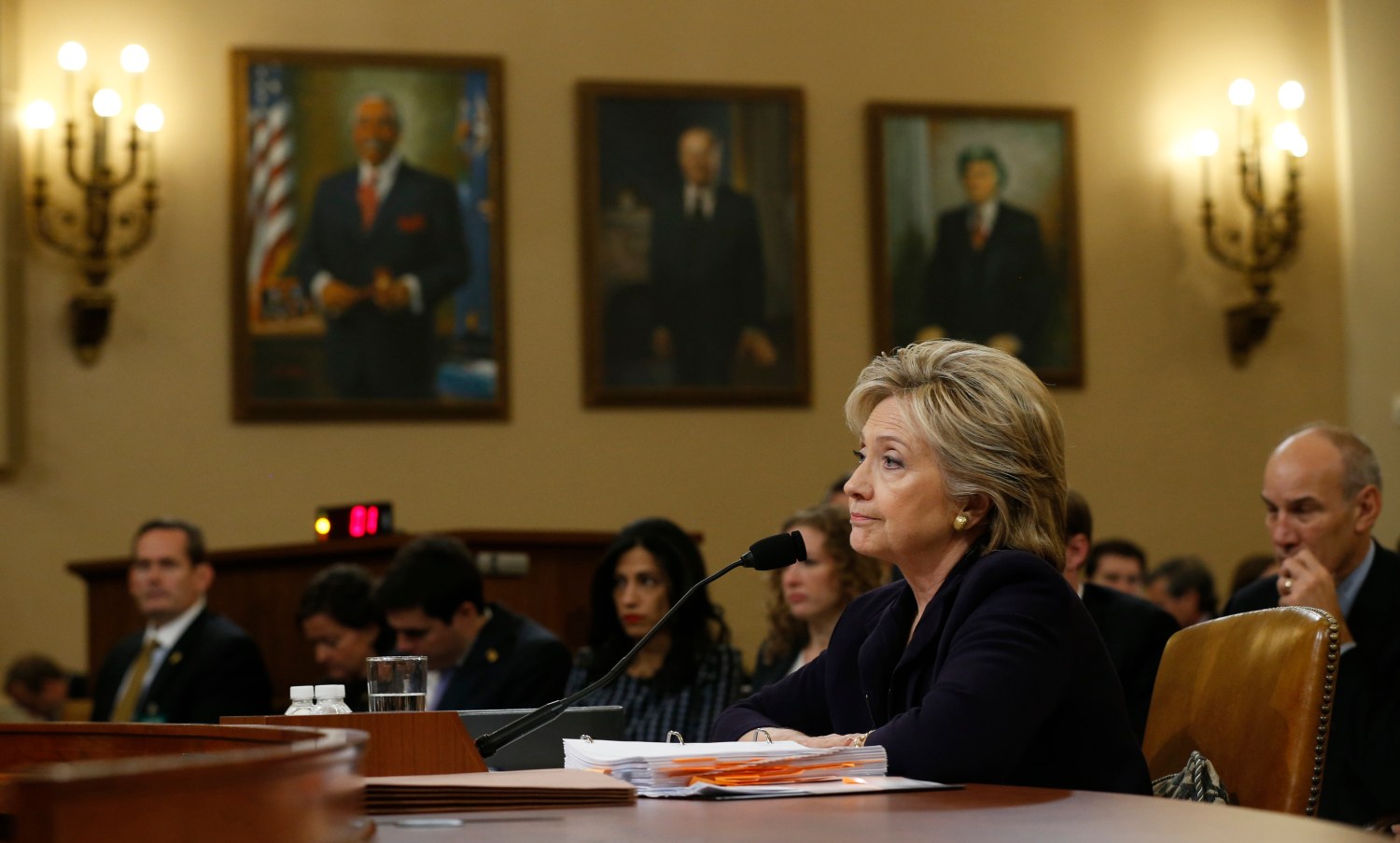 Democratic presidential candidate Hillary Clinton listens to a question as she testifies before the House Select Committee on Benghazi, on Capitol Hill in Washington October 22, 2015. The congressional committee is investigating the deadly 2012 attack on the U.S. diplomatic mission in Benghazi, Libya, when Clinton was the secretary of state.         REUTERS/Jonathan Ernst - TB3EBAM1CG6FG