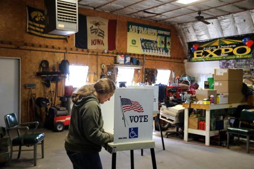 Jessica Cochran casts her ballot at a polling station set up in a garage during the U.S. presidential election, near Fernald, Iowa, U.S., November 8, 2016.  REUTERS/Scott Morgan - HT1ECB81IGN8I