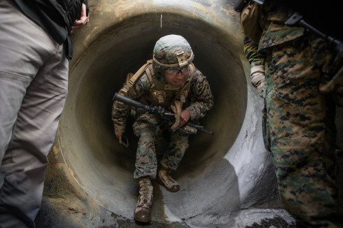 U.S. Marine Corps Lance Corporal Alberto Ramirez utilizes a communication system while underground during Urban Advanced Naval Technology Exercise 2018 (ANTX18) at Marine Corps Base Camp Pendleton, California, U.S. March 19, 2018. Picture taken March 19, 2018. U.S. Marine Corps/Lance Cpl. Rhita Daniel/Handout via REUTERS.   ATTENTION EDITORS - THIS IMAGE WAS PROVIDED BY A THIRD PARTY - RC13A748CBD0