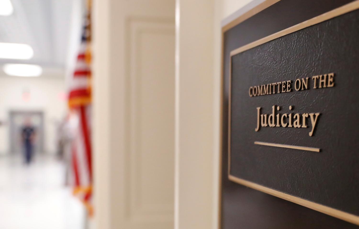 The sign for the House Judiciary Committee hearing room is visible at the Rayburn House office building where FBI lawyer Lisa Page failed to show up for a subpoena for a closed House Judiciary Committee deposition related to the ongoing congressional investigation into the Justice Department and FBI's decisions during the 2016 election in Washington, U.S., July 11, 2018. REUTERS/Leah Millis - RC11B1F228F0