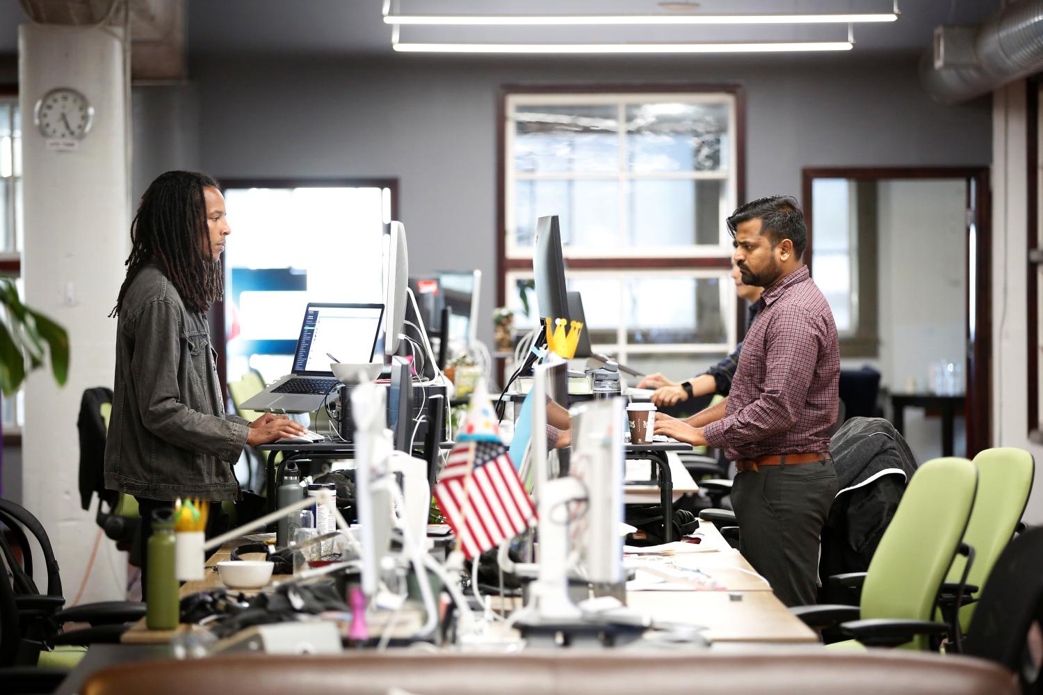 Employees work at the TaskRabbit office in San Francisco, California, U.S., September 13, 2018. Picture taken September 13, 2018. REUTERS/Stephen Lam - RC1D0CD5F970