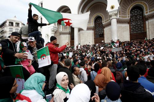 People carry national flags and banners during a protest calling on President Abdelaziz Bouteflika to quit, in Algiers, Algeria March 26, 2019. REUTERS/Ramzi Boudina - RC1FD43A5650