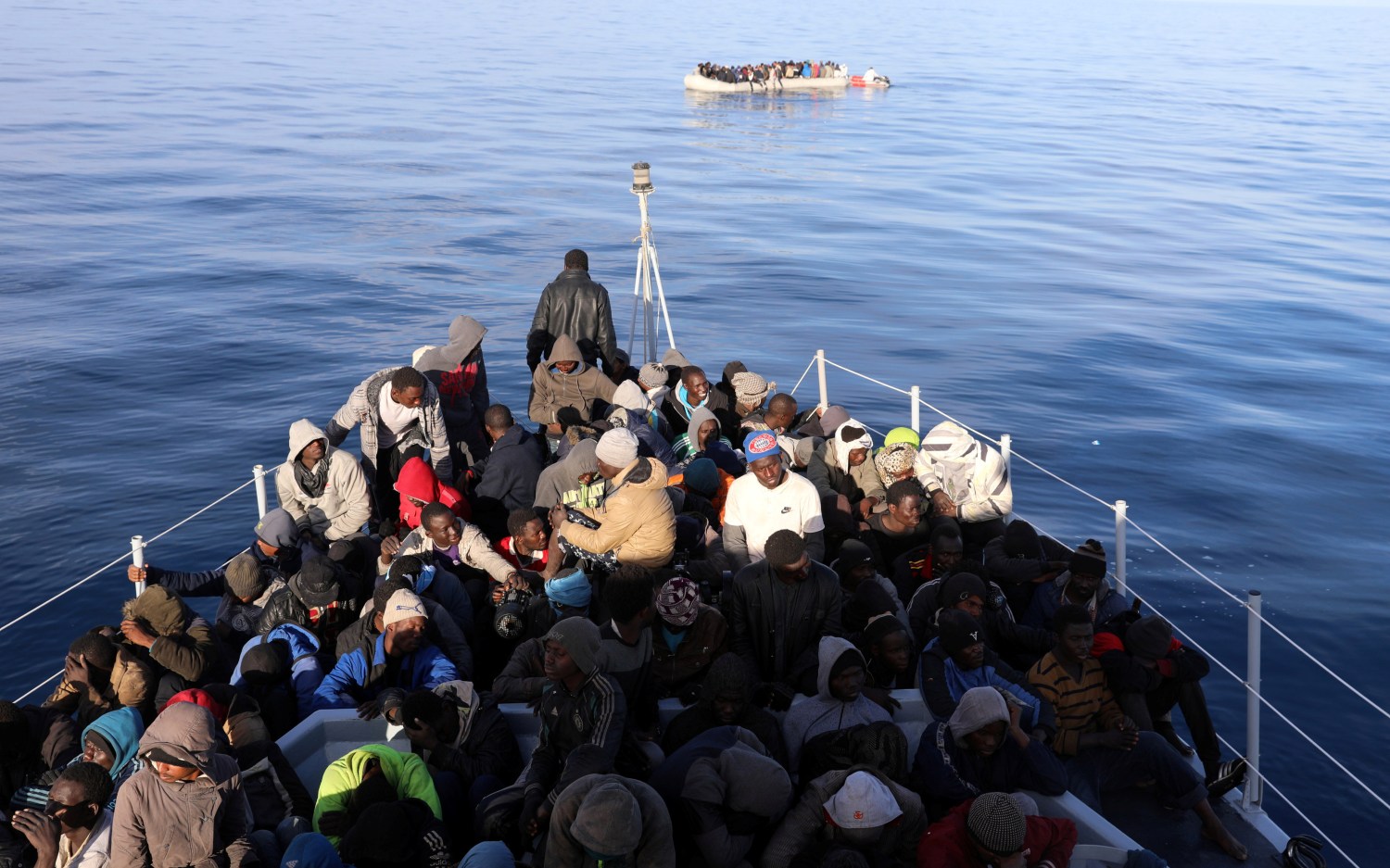 Migrants are seen as they are rescued by Libyan coast guards in the Mediterranean Sea off the coast of Libya, January 15, 2018. Picture taken January 15, 2018. REUTERS/Hani Amara - RC18027683D0