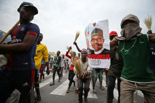Supporters of Nigeria's President Muhammadu Buhari celebrate in Kano, Nigeria February 27, 2019. REUTERS/Afolabi Sotunde - RC1BC88583D0