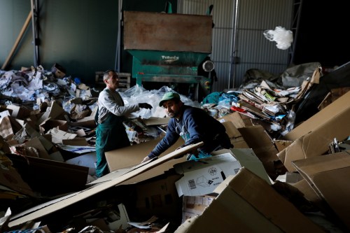 Employees works at a recycling factory in Belgrade, Serbia, February 28, 2019. Picture taken February 28, 2019. REUTERS/Marko Djurica - RC1F23F0C560