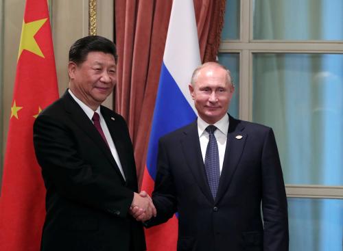 Russia's President Vladimir Putin (R) shakes hands with China's President Xi Jinping during a meeting on the sidelines of the G20 summit in Buenos Aires, Argentina November 30, 2018. Picture taken November 30, 2018. Sputnik/Mikhail Klimentyev/Kremlin via REUTERS  ATTENTION EDITORS - THIS IMAGE WAS PROVIDED BY A THIRD PARTY. - RC1AB6752940