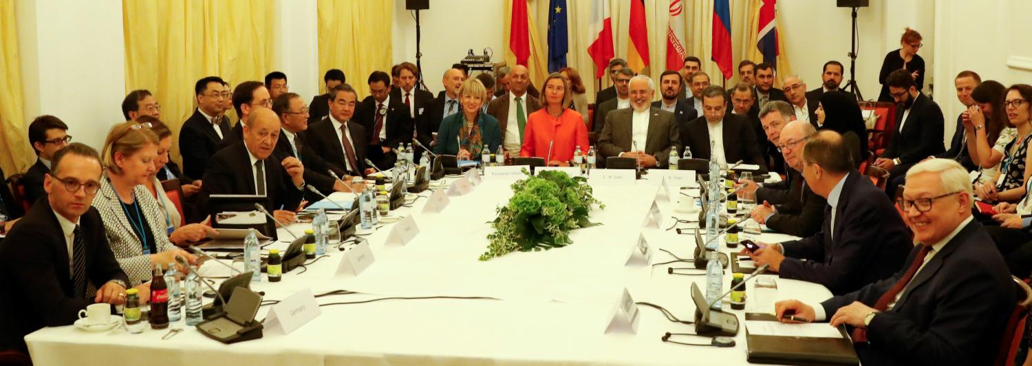 German Foreign Minister Heiko Maas, French Foreign Minister Jean-Yves Le Drian, Chinese Foreign Minister Wang Yi, European Union High Representative for Foreign Affairs and Security Policy Federica Mogherini, Iran's Foreign Minister Mohammad Javad Zarif and Russian Foreign Minister Sergei Lavrov attend a meeting in Vienna, Austria July 6, 2018.   REUTERS/Leonhard Foeger - RC1204DC5E70