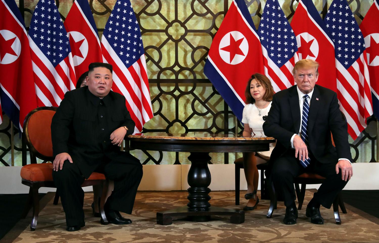 FILE PHOTO: North Korean leader Kim Jong Un and U.S. President Donald Trump listen to questions from the media during their one-on-one bilateral meeting at the second North Korea-U.S. summit in the Metropole hotel in Hanoi, Vietnam February 28, 2019. REUTERS/Leah Millis/File Photo - RC1CA46BF930