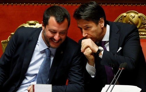 Deputy Prime Minister Matteo Salvini speaks with Italian Prime Minister Giuseppe Conte in the upper house of the Italian parliament, in Rome, Italy March 20, 2019. REUTERS/Yara Nardi - RC162C8E4190