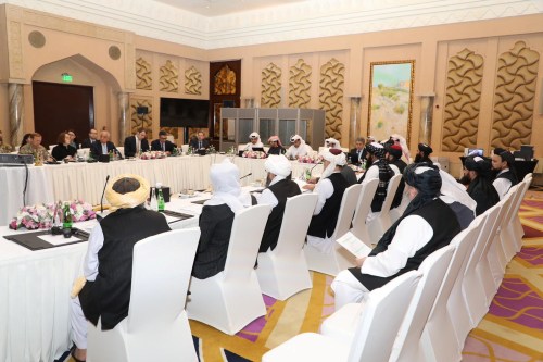 Undated handout picture of U.S., Taliban and Qatar officials during a meeting for peace talks in Doha, Qatar. Qatari Foreign Ministry/Handout via REUTERS ATTENTION EDITORS - THIS PICTURE WAS PROVIDED BY A THIRD PARTY. - RC1623E5FFE0