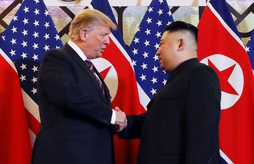 U.S. President Donald Trump and North Korean leader Kim Jong Un shake hands before their one-on-one chat during the second U.S.-North Korea summit at the Metropole Hotel in Hanoi, Vietnam February 27, 2019. REUTERS/Leah Millis     TPX IMAGES OF THE DAY - RC16A5993080