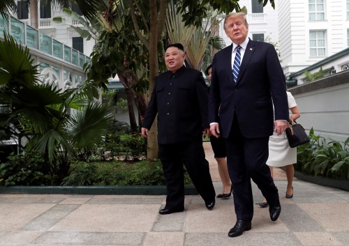North Korean leader Kim Jong Un and U.S. President Donald Trump walk in the garden of the Metropole hotel during the second North Korea-U.S. summit in Hanoi, Vietnam February 28, 2019. REUTERS/Leah Millis - RC1856057A00