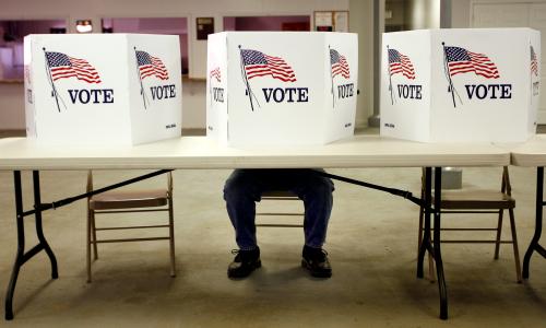 A voter casts a ballot at the Flushing Volunteer Fire Department in Flushing, Ohio, March 6, 2012. Republicans are holding their "Super Tuesday" presidential primary in 10 states.    REUTERS/Matt Sullivan    (UNITED STATES - Tags: ELECTIONS POLITICS TPX IMAGES OF THE DAY) - GM1E8370HRA01