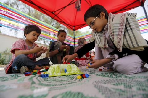 Boys play at a school in Yemen's capital Sanaa sheltering them and their families after the conflict forced them to flee their areas from the Houthi-controlled northern province of Saada August 4, 2015. A Saudi-led Arab alliance launched a military campaign on March 26 to end Houthi control over much of Yemen and to return President Abd-Rabbu Mansour Hadi from exile. REUTERS/Khaled Abdullah - GF20000013228