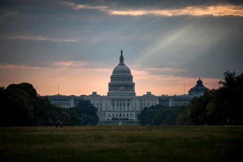 The U.S. Capitol building is seen on Tuesday morning after the federal government was shutdown when the House and Senate failed to pass a budget in Washington October 1, 2013. The lawmakers who shut down the U.S. government on Tuesday have the best view of the result from their perch in the U.S. Capitol: a two-mile stretch of museums, monuments and federal buildings along the National Mall that were closed for business. REUTERS/James Lawler Duggan   (UNITED STATES - Tags: POLITICS BUSINESS) - GM1E9A11QZF01