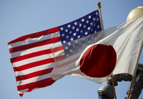 The U.S. and Japan flags fly together outside the White House in Washington April 27, 2015.  Japanese Prime Minister Shinzo Abe will meet with U.S. President Barack Obama on Tuesday as part of his eight day visit to the United States. REUTERS/Kevin Lamarque   - GF10000074390