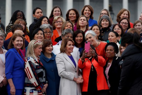 U.S. House Speaker Nancy Pelosi (D-CA) poses for a selfie during a photo opportunity with House Democratic women of the 116th Congress on Capitol Hill in Washington, U.S., January 4, 2019. REUTERS/Leah Millis??     TPX IMAGES OF THE DAY - RC1474F482B0